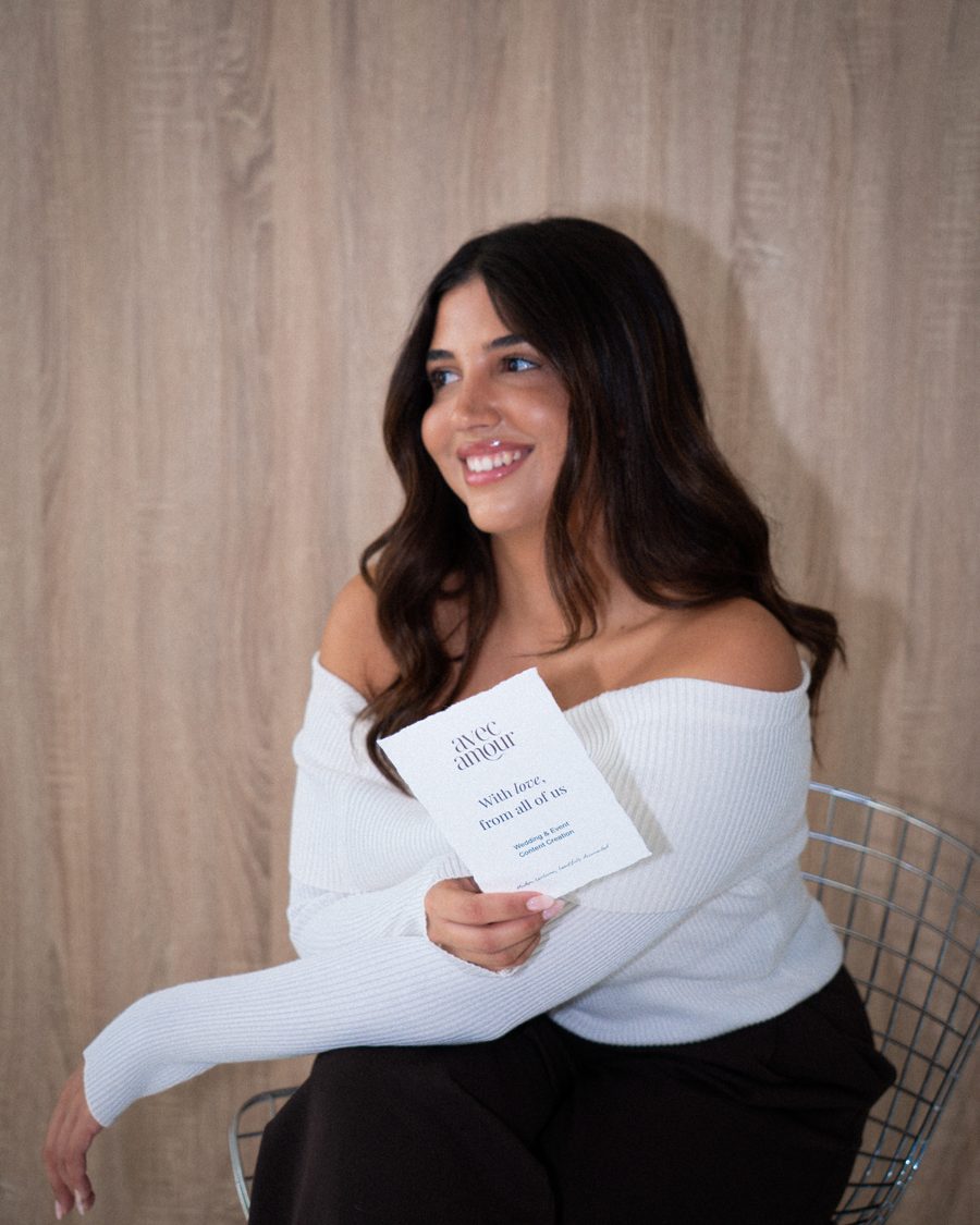 Lauren holding her With love card