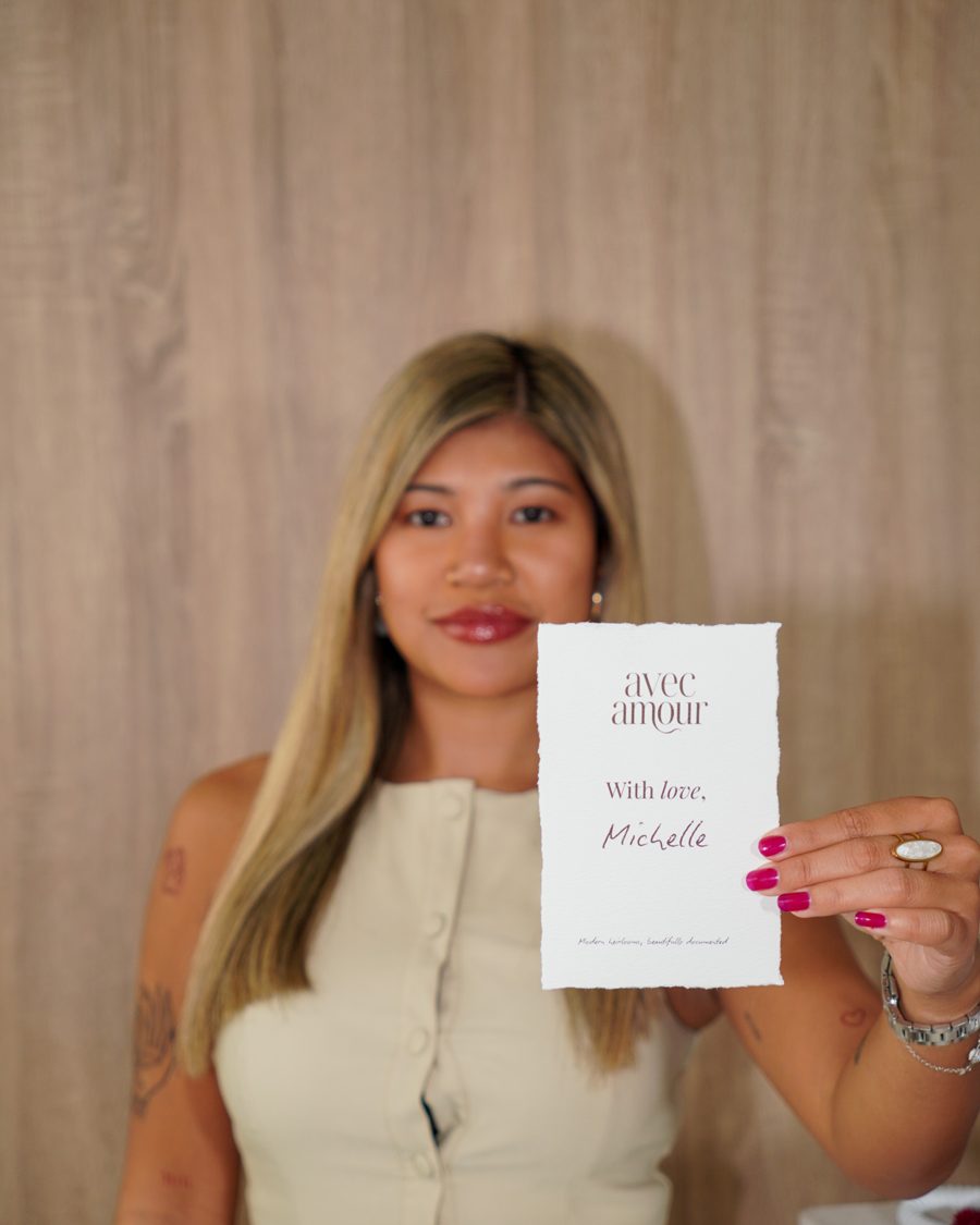 Michelle holding her With love card